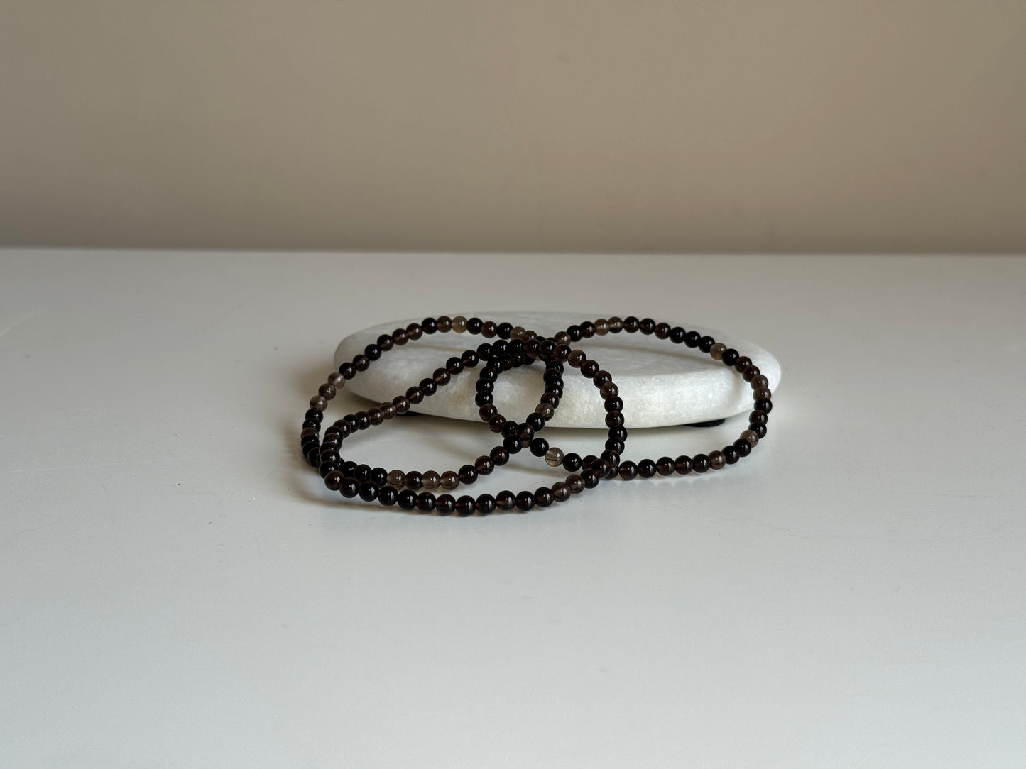 Rookkwarts armband 4 mm kraal