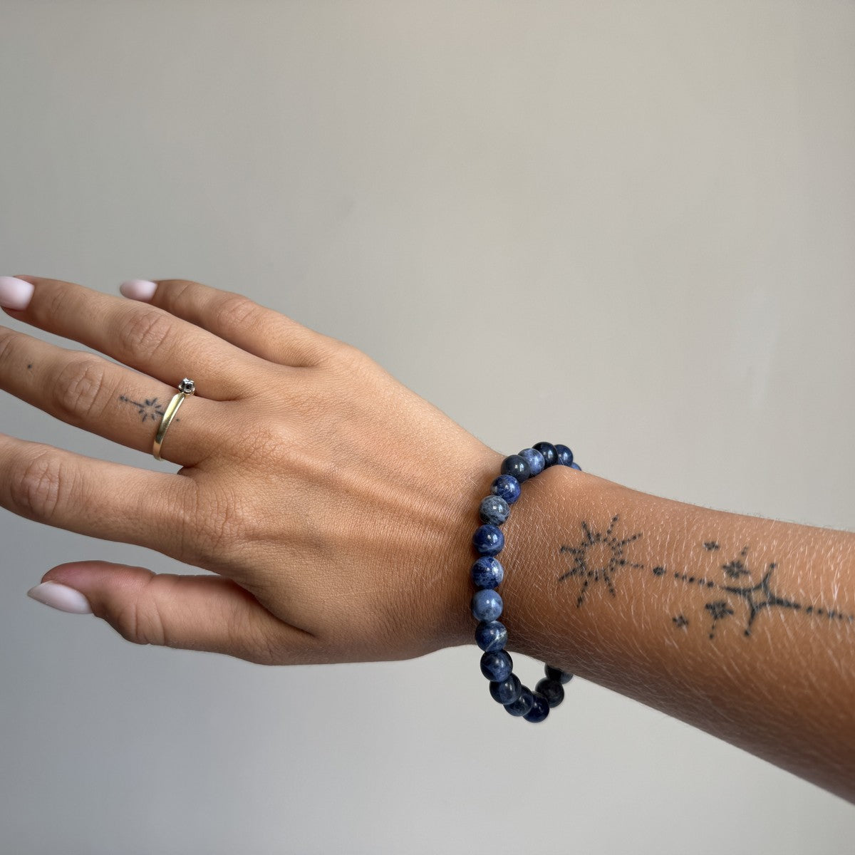 Sodaliet armband 8 mm kraal