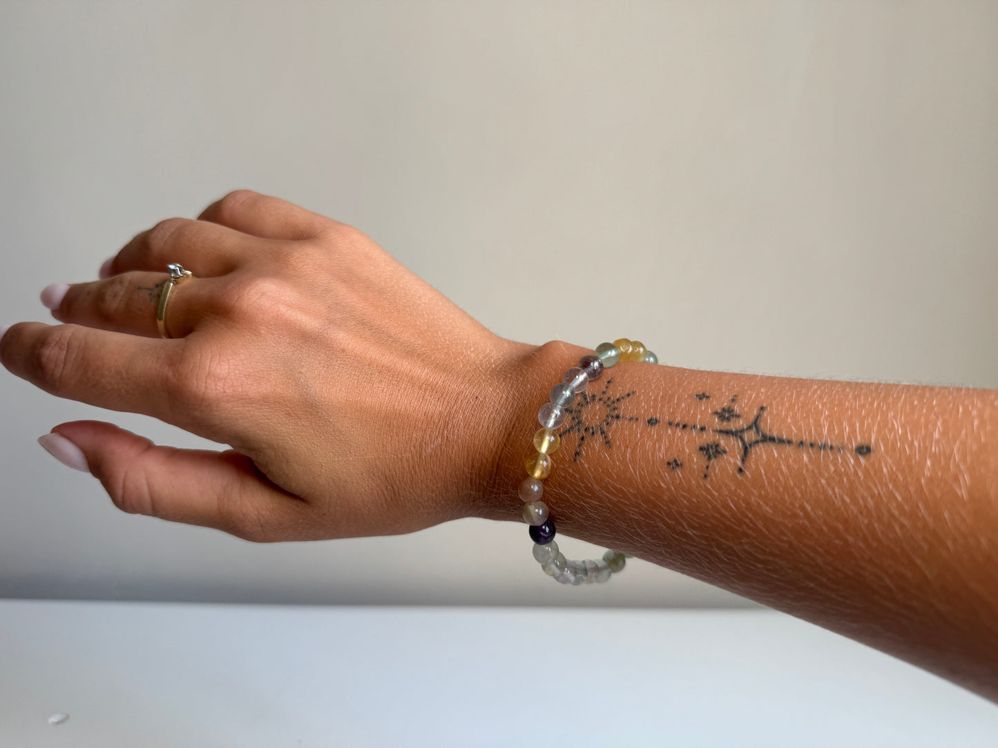 Regenboog fluoriet - armband 6 mm kraal